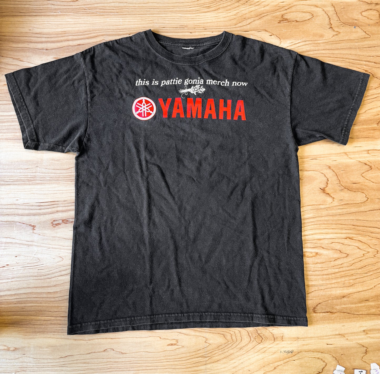 this is pattie gonia merch now - cream print
