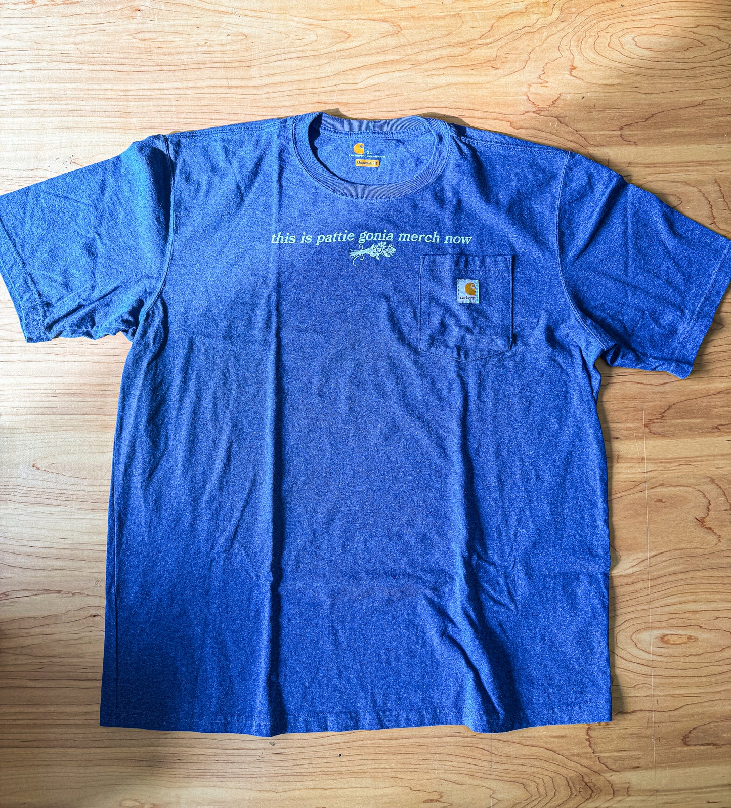 this is pattie gonia merch now - cream print